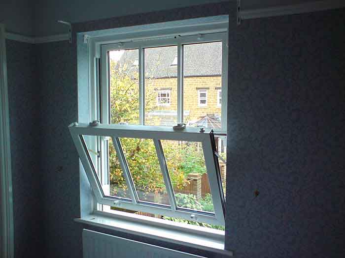 A vertical slider window